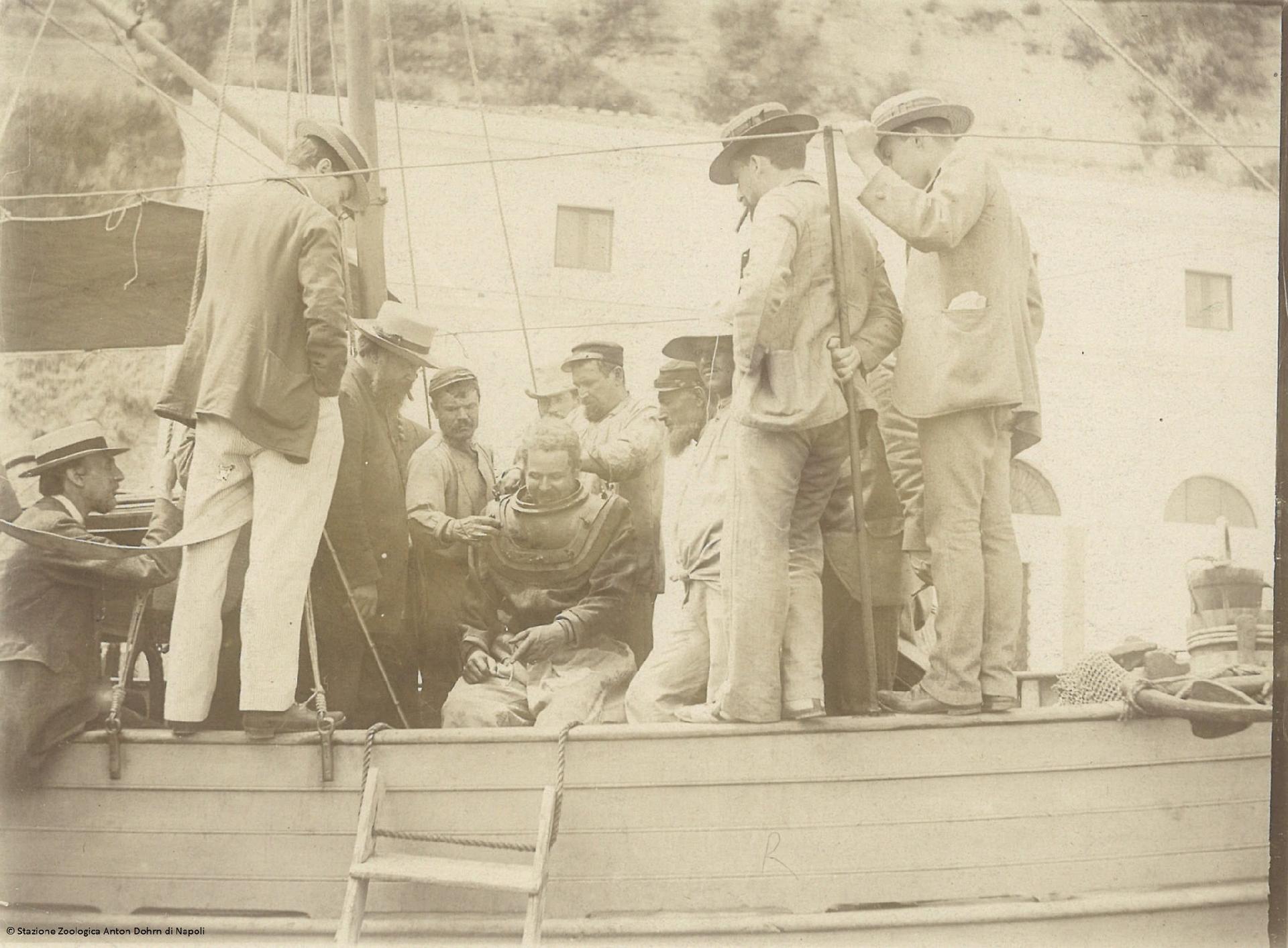Anton Dohrn together with researchers and the deep-sea diver during the preparation for submersion for collection of specimens - Stazione zoologica Anton Dohrn di Napoli